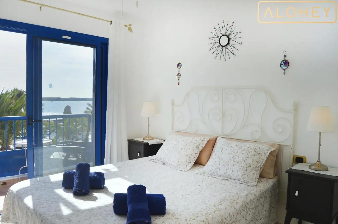 Casa Maresia Las Moreras Con Vista Mar En Primera Linea Y Piscina Compartida Playa Blanca  Spain